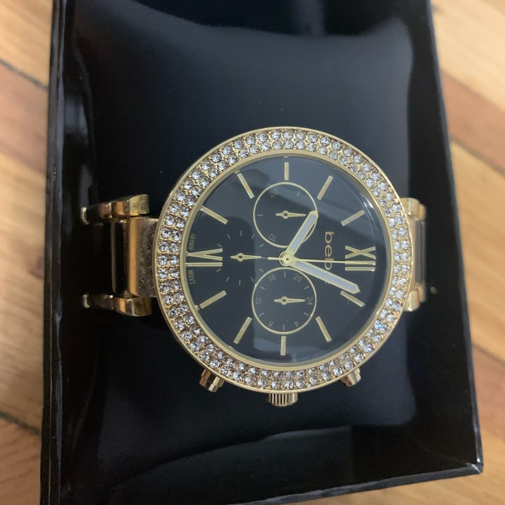 Bebe black and gold watch